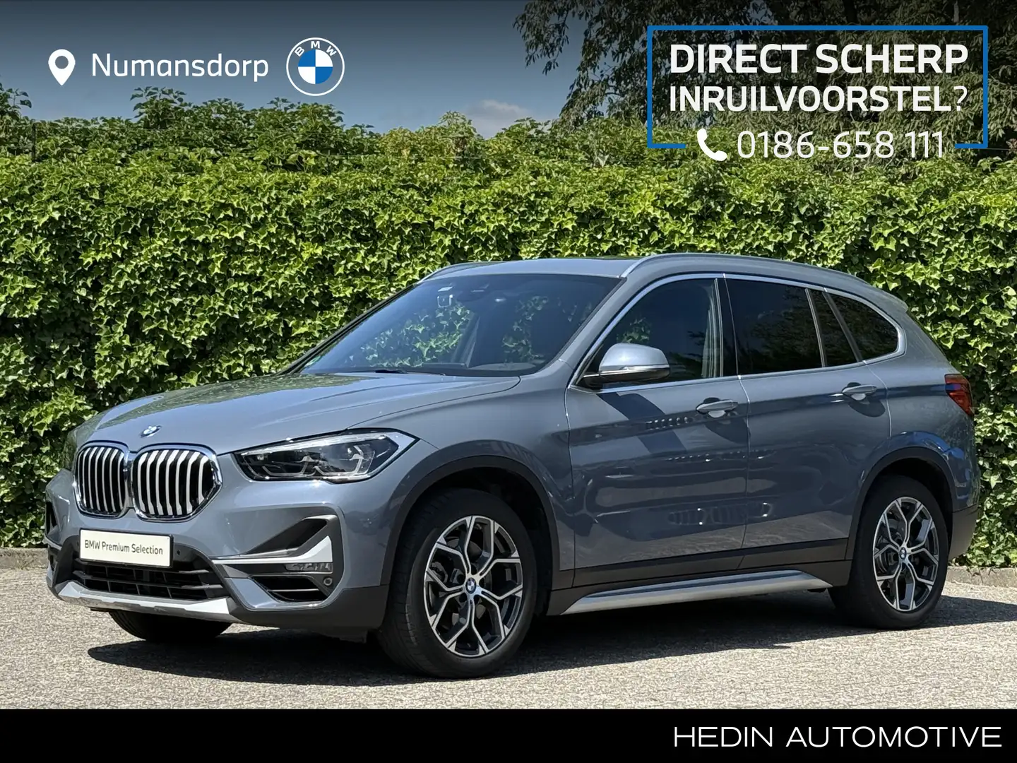 BMW X1 sDrive20i | Panorama | Driving ass. Plus | Camera Grijs - 1