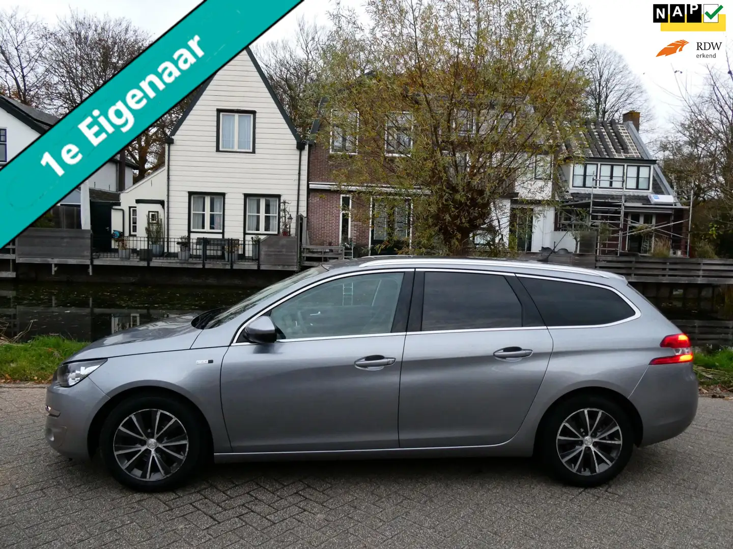 Peugeot 308 SW 1.2i Style 110pk 123.000km 1e eig. Clima Navi Grau - 1