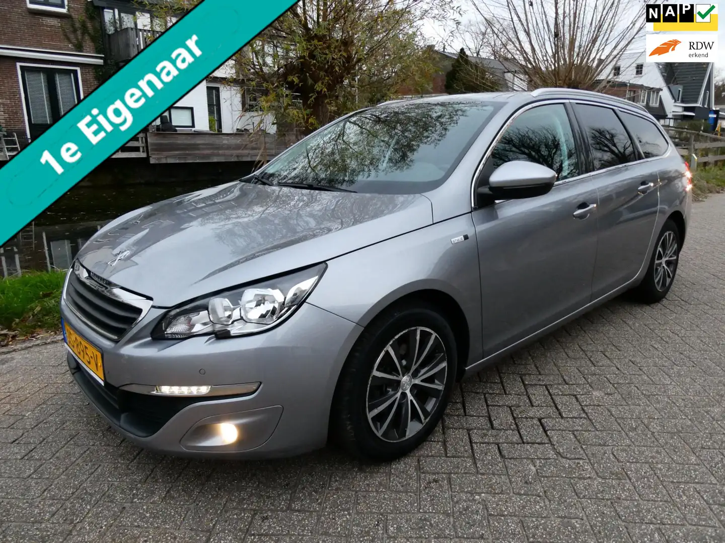 Peugeot 308 SW 1.2i Style 110pk 123.000km 1e eig. Clima Navi T Gris - 1