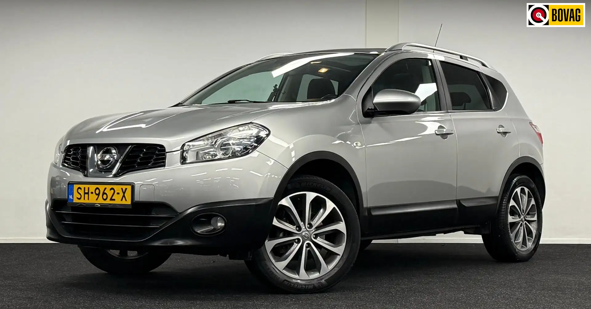 Nissan Qashqai 2.0 Acenta 4WD*Automaat*Panodak*Navi*Camera* Gris - 1