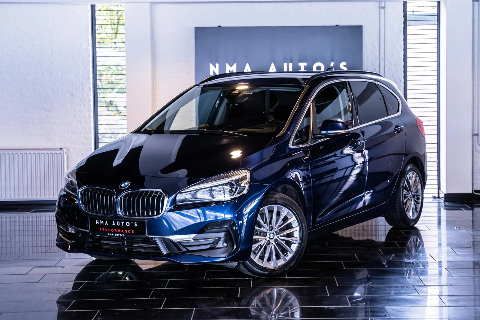 BMW 225 2-serie Active Tourer 225xe iPerformance HEAD-UP | Blauw - 1