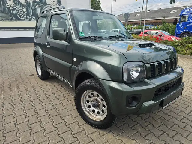 Suzuki Jimny Jimny Club Ranger,4*4 Allrad,AHK,ZV,el.Fenster,1.Hand,Tüv Neu