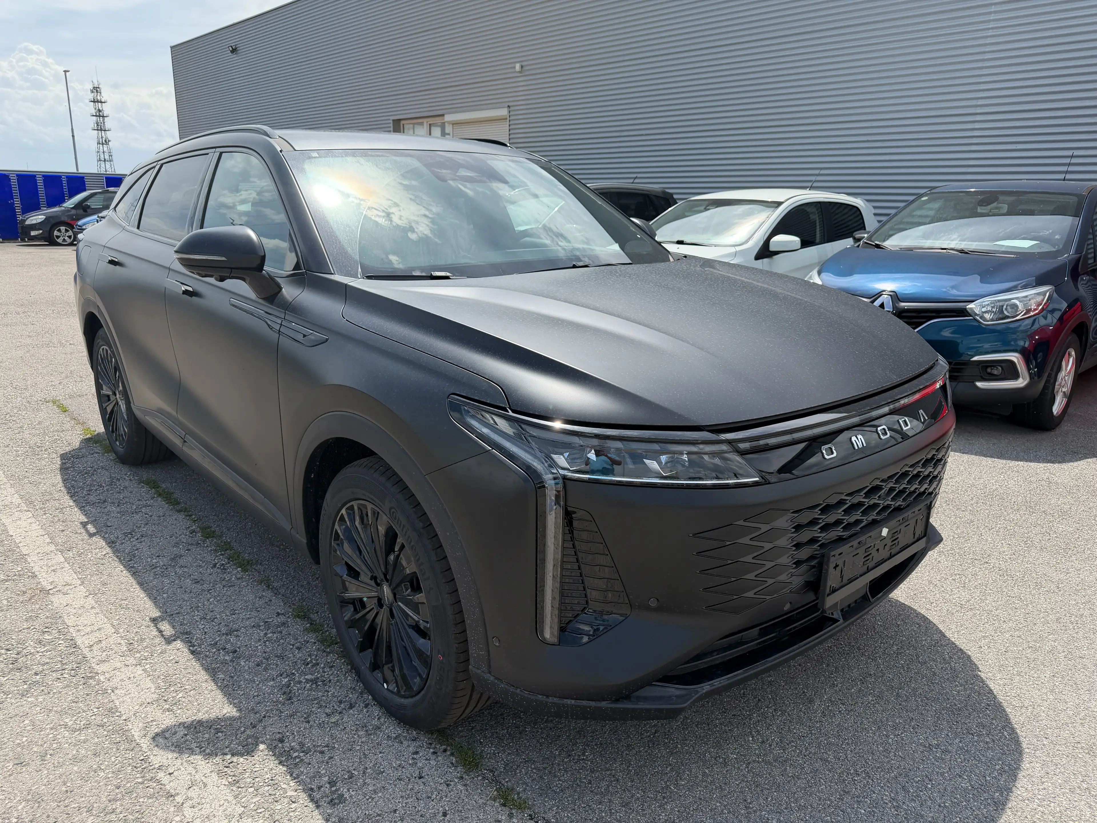 Omoda 9 Premium PHEV Black Edition — photo 3
