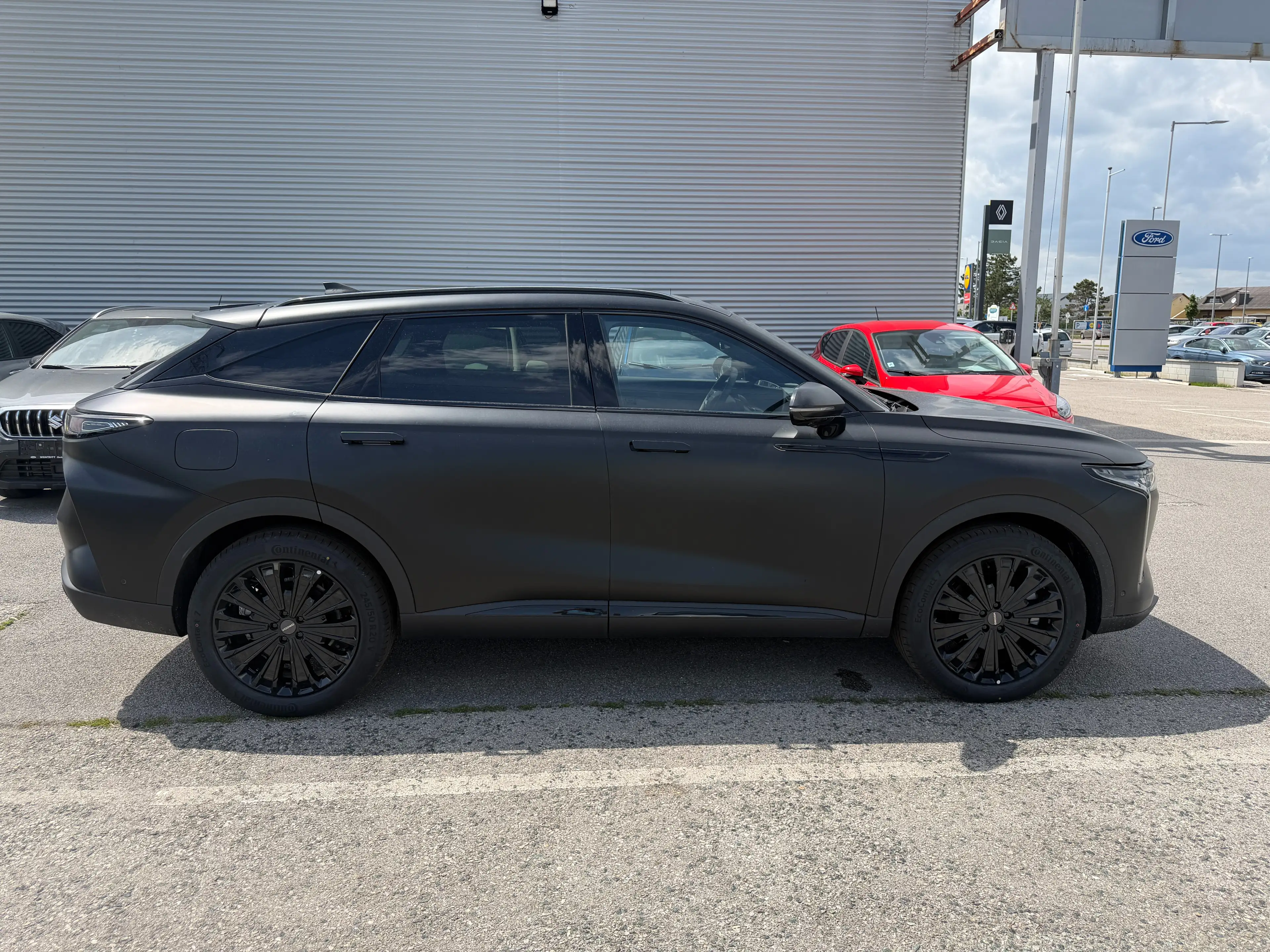 Omoda 9 Premium PHEV Black Edition — photo 4