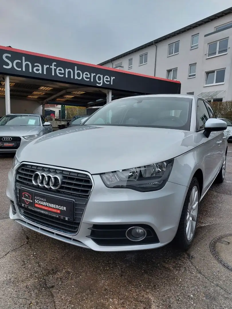 Audi A1 Sportback+V.Histor+SitzH+Automatik+Allwetter+ Silber - 1