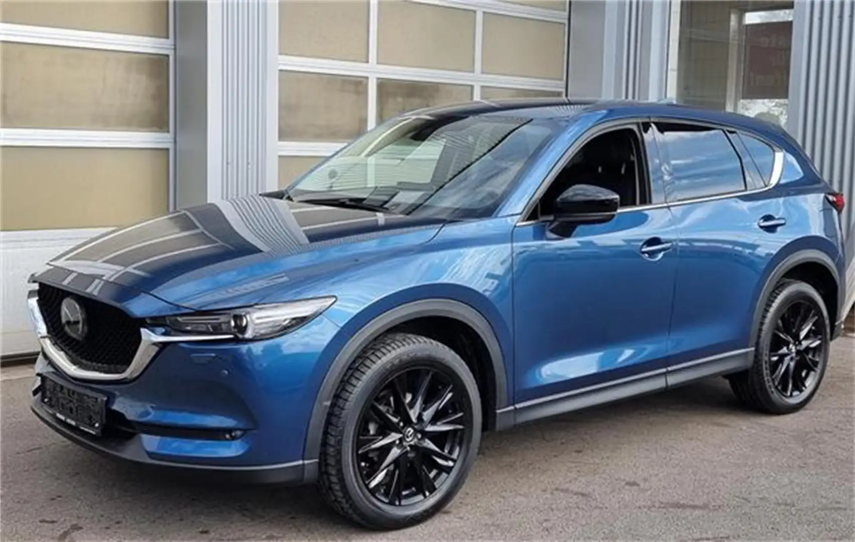 Mazda CX-5 G165 AWD Homura Blau - 1
