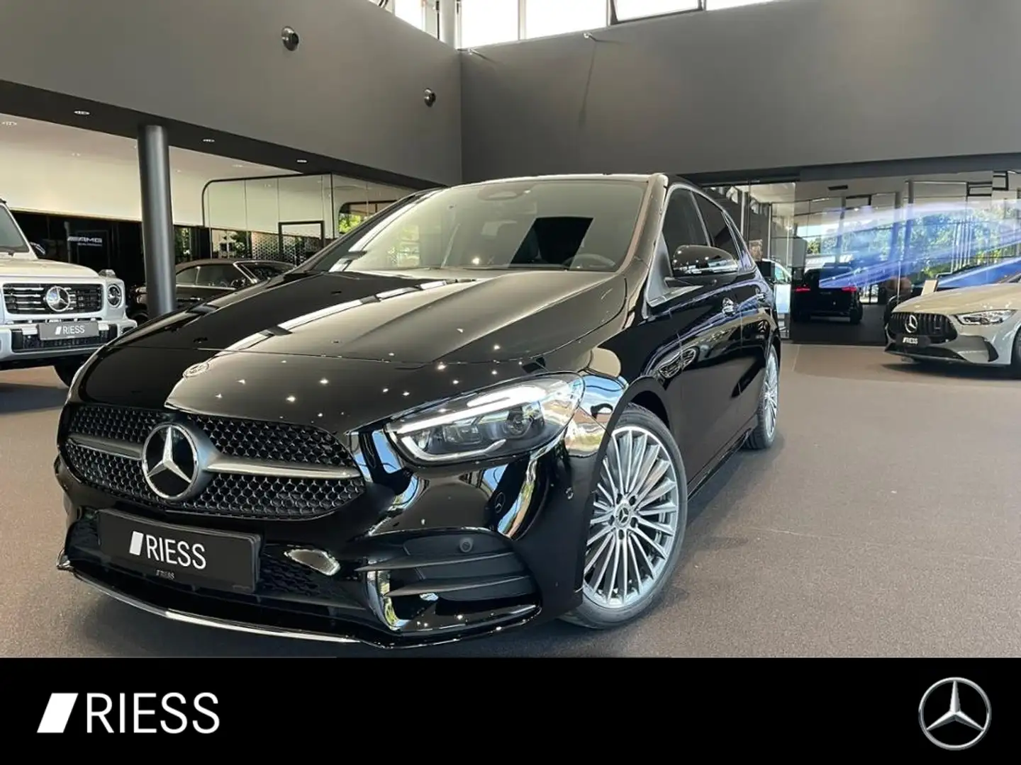 Mercedes-Benz B 220 4M AMG+PANO+AHK+DISTR+HUD+MULTIB+KEYL+360° Schwarz - 1