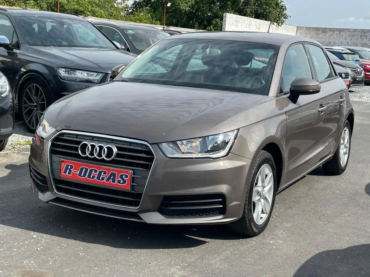 Audi A1 1.O TFSI NAVIGATION CLIMATISATION GARANTIE Bruin - 1