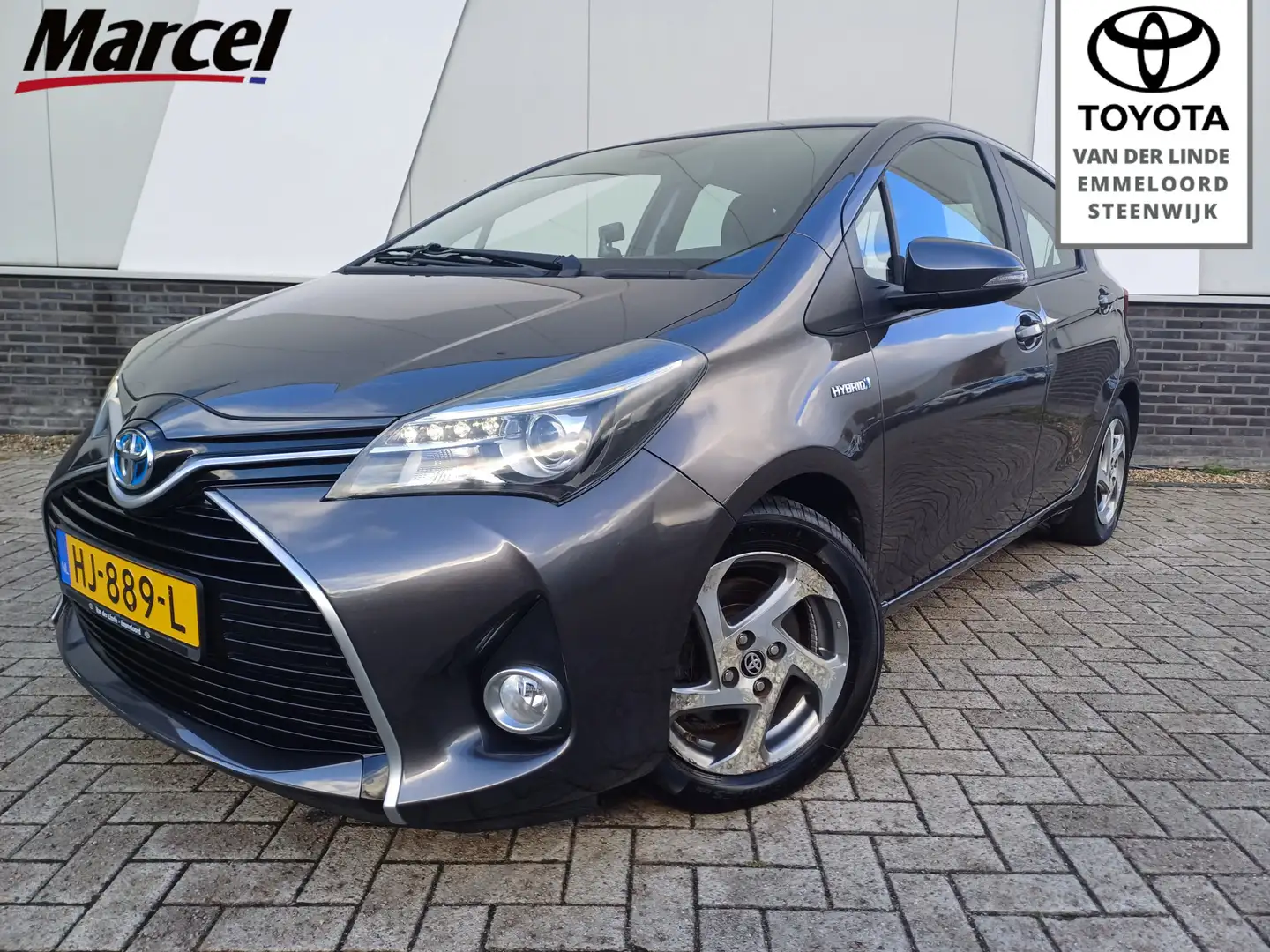 Toyota Yaris 1.5 Hybrid Lease | LM velgen | Cruise-control | EC Gris - 1