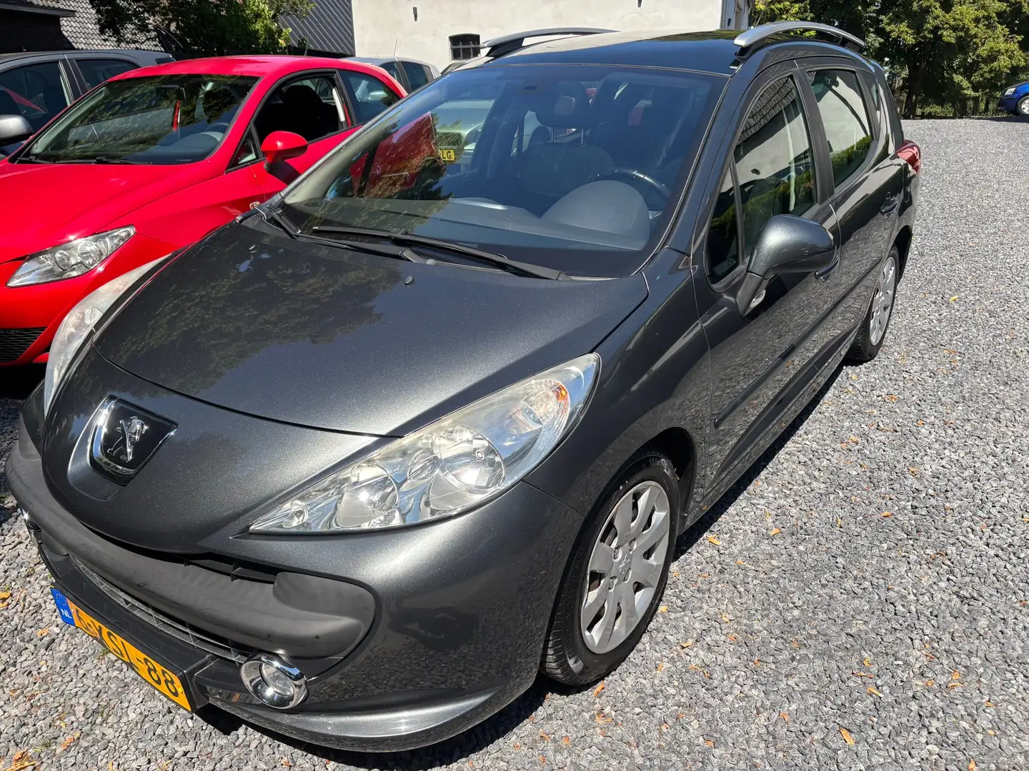 Peugeot 207 SW 1.6 VTi XS AUTOMAAT KM 154210 MET NAP Grijs - 1