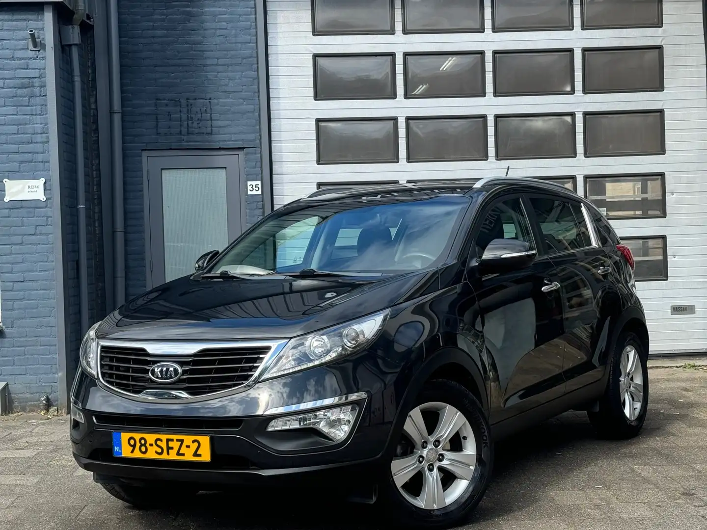 Kia Sportage 1.6 GDI X-Ecutive Plus Pack | Clima | Navi | Camer Schwarz - 1