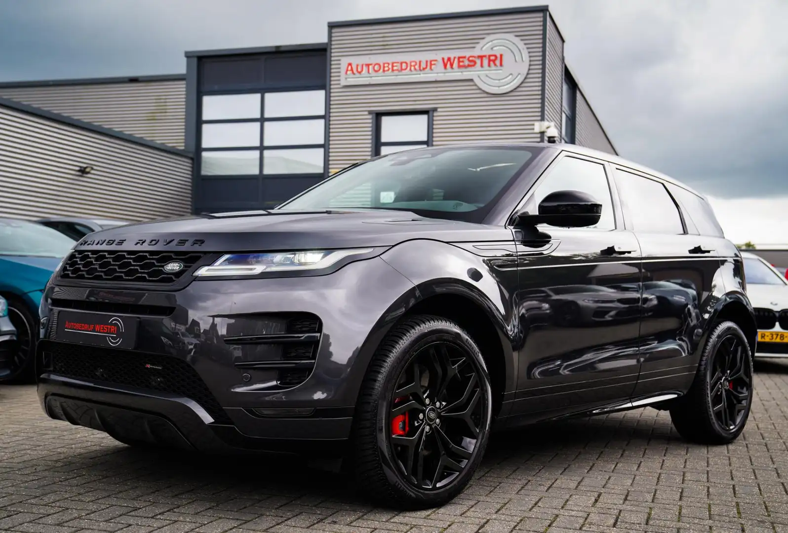 Land Rover Range Rover Evoque 1.5 P300e AWD Autobiography | Panorama | R-dynamic Grijs - 1