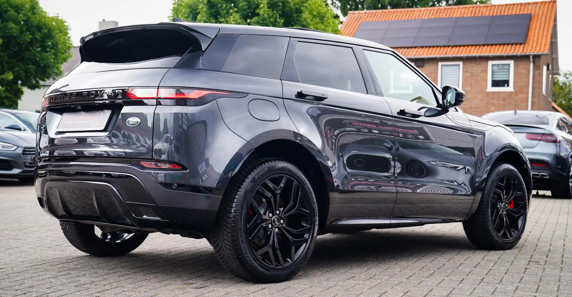 Land Rover Range Rover Evoque 1.5 P300e AWD Autobiography | Panorama | R-dynamic Grijs - 2