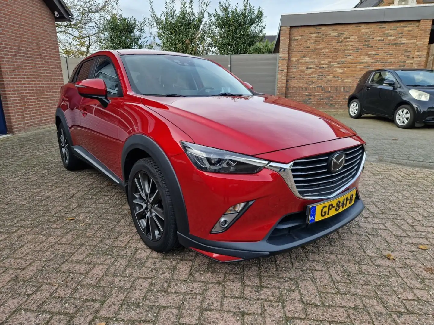 Mazda CX-3 2.0 SkyActiv-G 120 GT-M NL-auto Navi Leer Camera S Rood - 2
