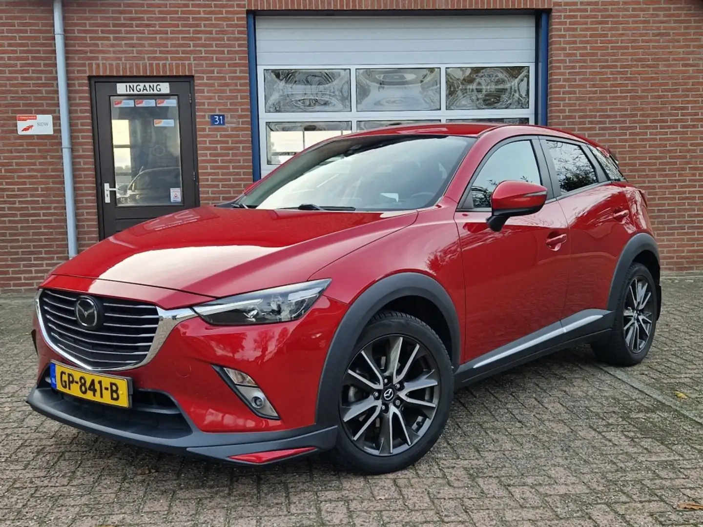 Mazda CX-3 2.0 SkyActiv-G 120 GT-M NL-auto Navi Leer Camera S Rood - 1