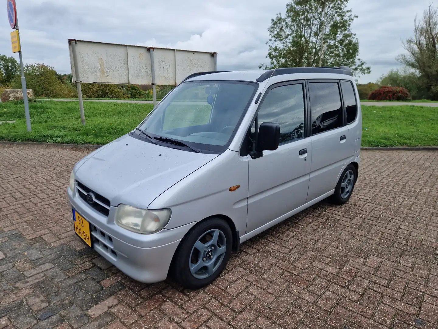 Daihatsu Move 1.0-12V Grijs - 1