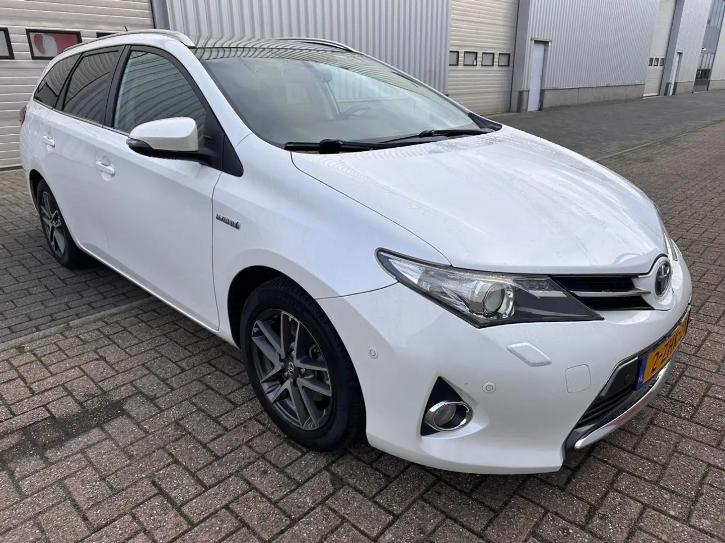 Toyota Auris Touring Sports 1.8 Hybrid Lease Wit - 1