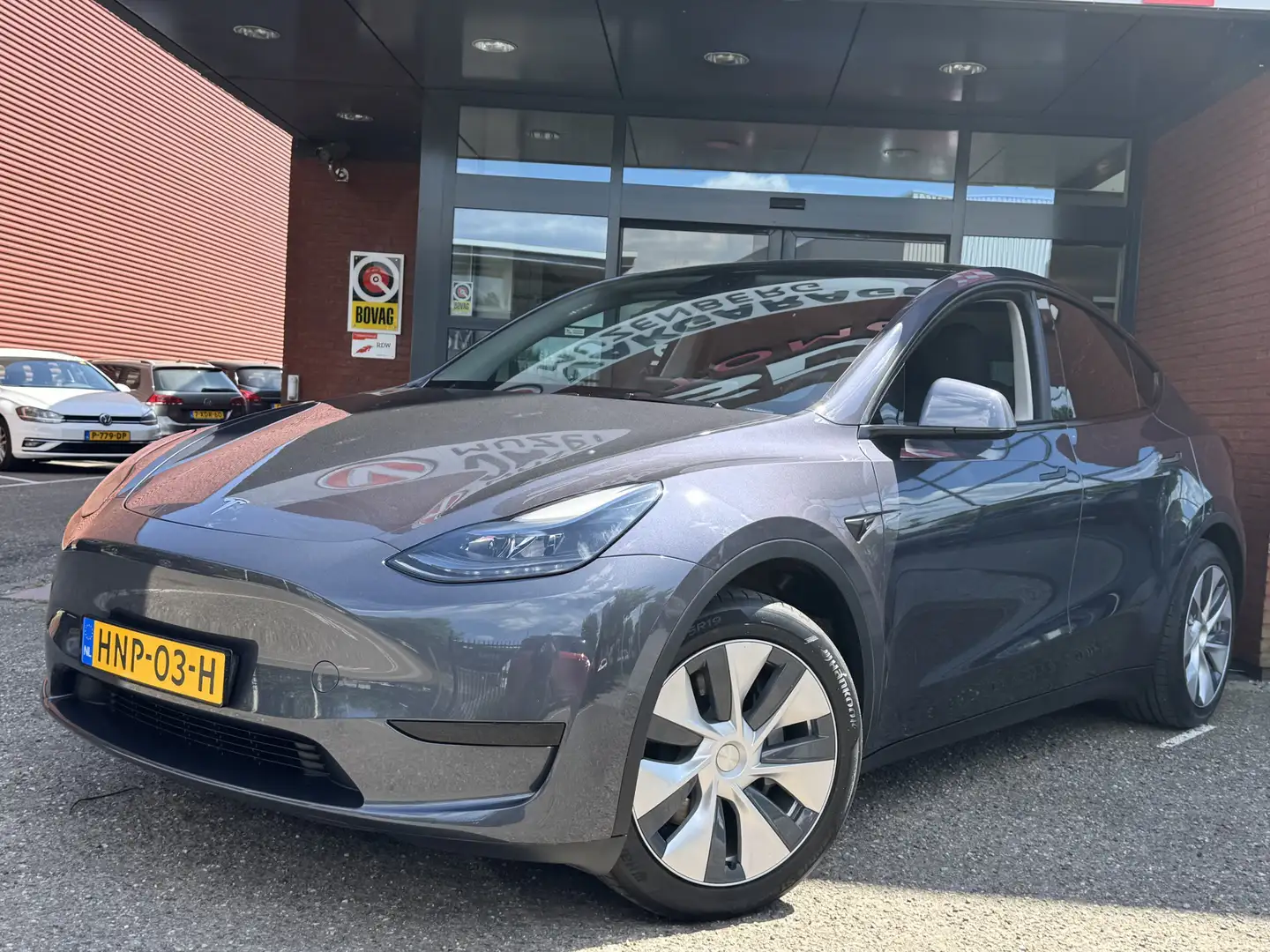 Tesla Model Y RWD 58 kWh // AUTOPILOT // CLIMA // LEDER // 360 C Grijs - 2