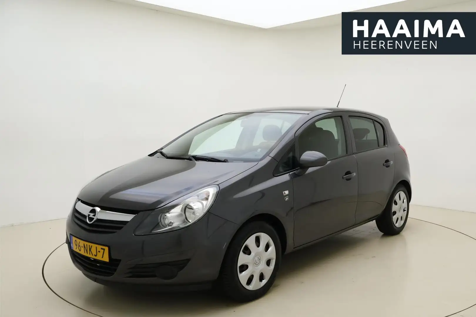 Opel Corsa 1.2 16v 85pk 5drs '111' Edition | Airco | Cruise c Grijs - 1