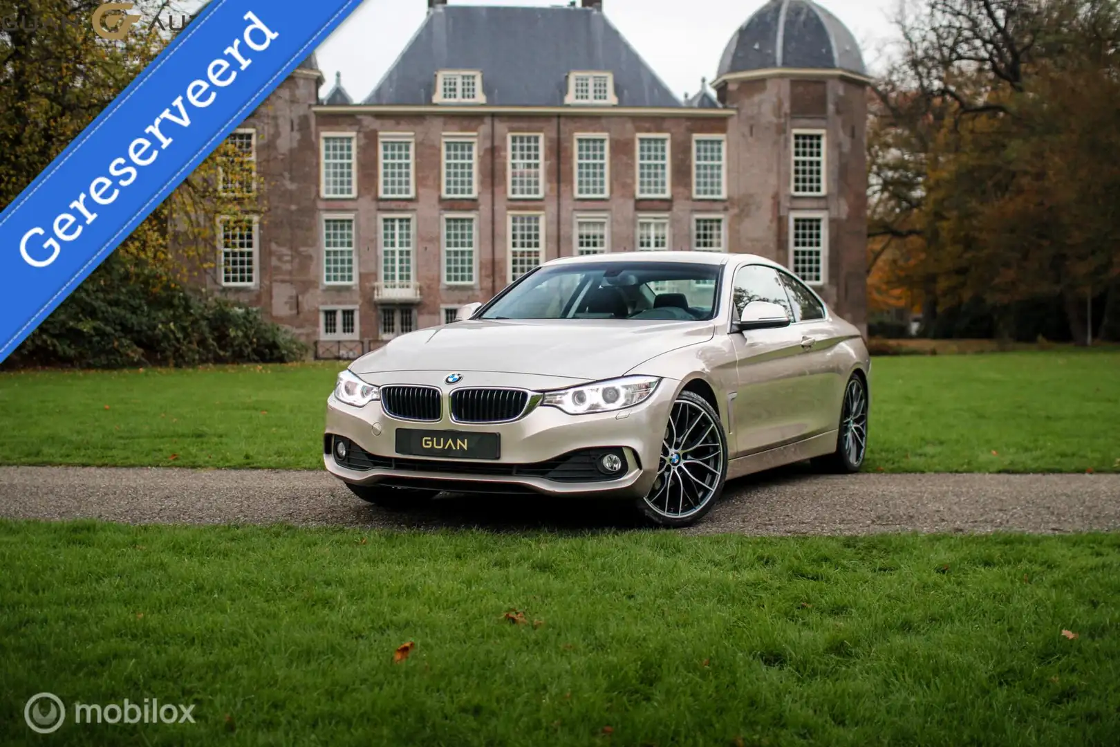 BMW 420 4-serie Coupé 420i Executive | NAP | 20 inch lm | Grijs - 1