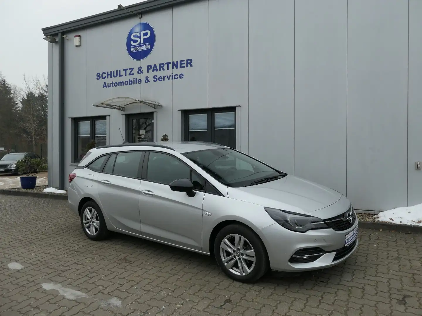 Opel Astra K 1.5 Edition 1.Hd., R-Cam, Lenk. + Sitzh. Silber - 1