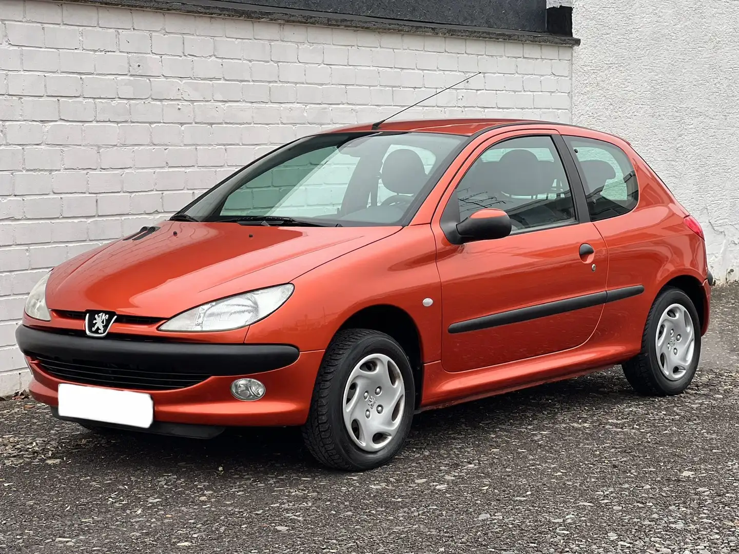 Peugeot 206 1.4 TÜV 10/26*KLIMA*ALLWETTER*EL. FENST*USB/AUX Orange - 1