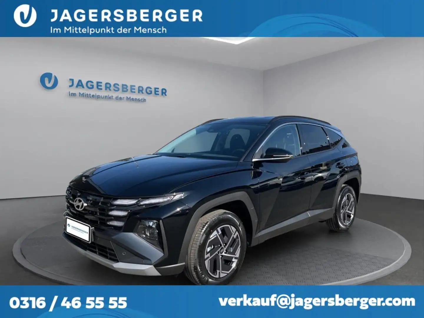 Hyundai TUCSON 1,6 T-GDI HEV 4WD Jubilé Aut. Schwarz - 1