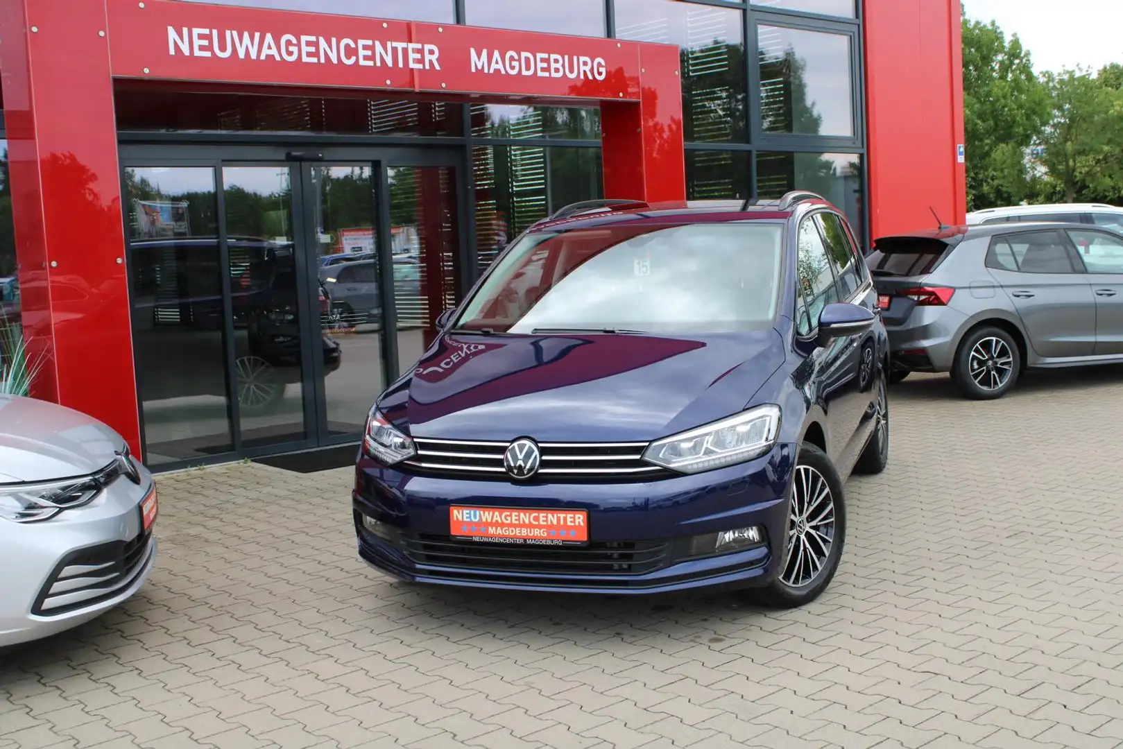 Volkswagen Touran 1.5 TSI Comfortline*7-SITZER*ST.HZG*PANO*AHK*SOUND Blau - 2
