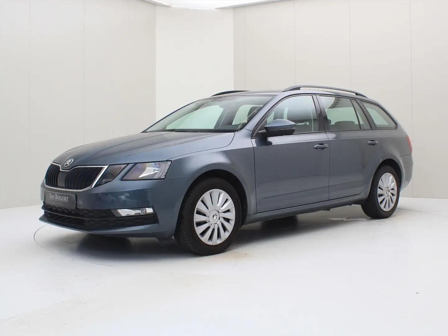 Skoda Octavia Combi 1.0 TSI 115PK DSG7 TREKHAAK+NAVIGATIE+STOELV Grijs - 1