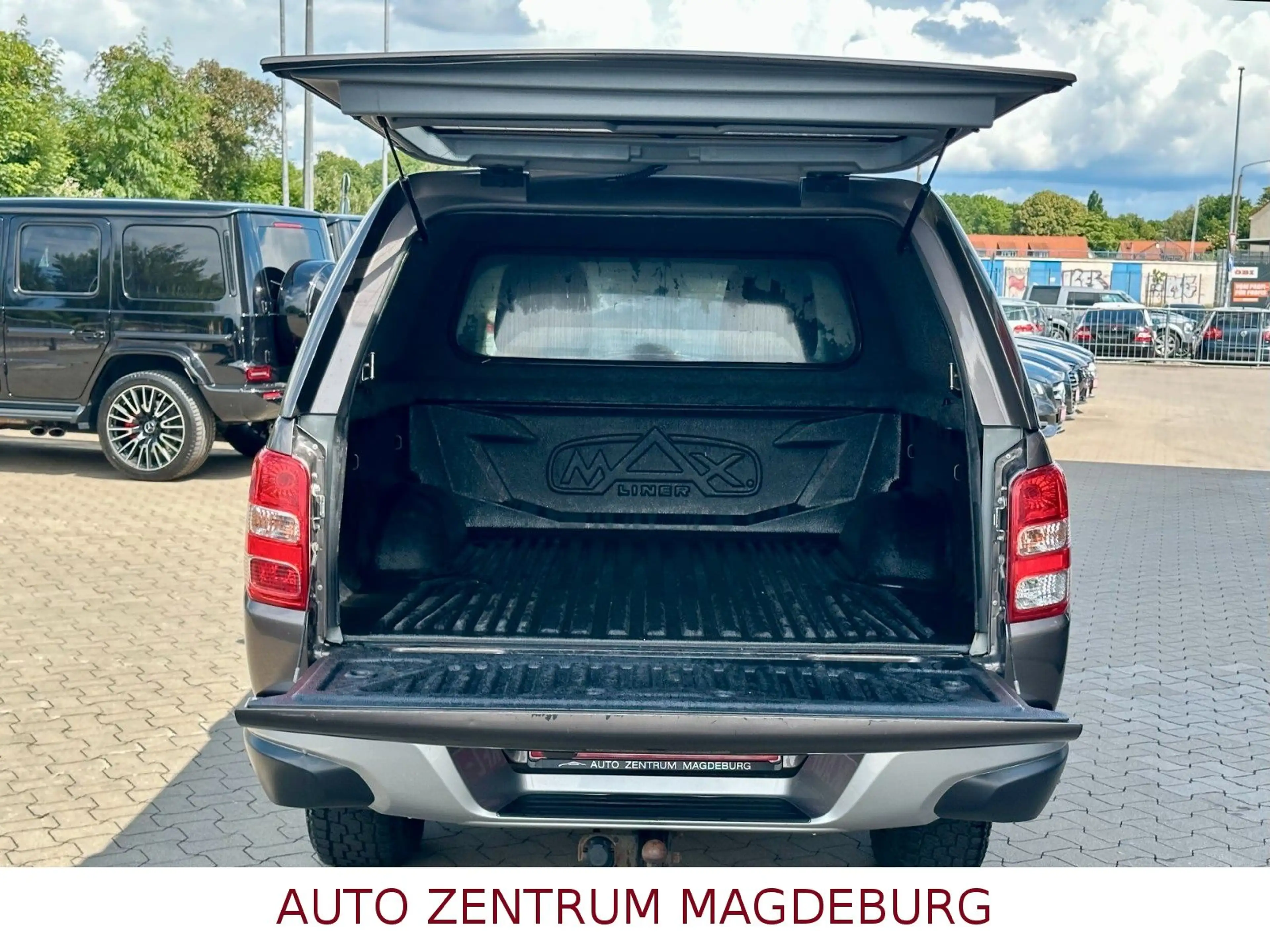 Mitsubishi L200 Plus Club Cab 4WD ALU*ALLRAD*AHK* — photo 8