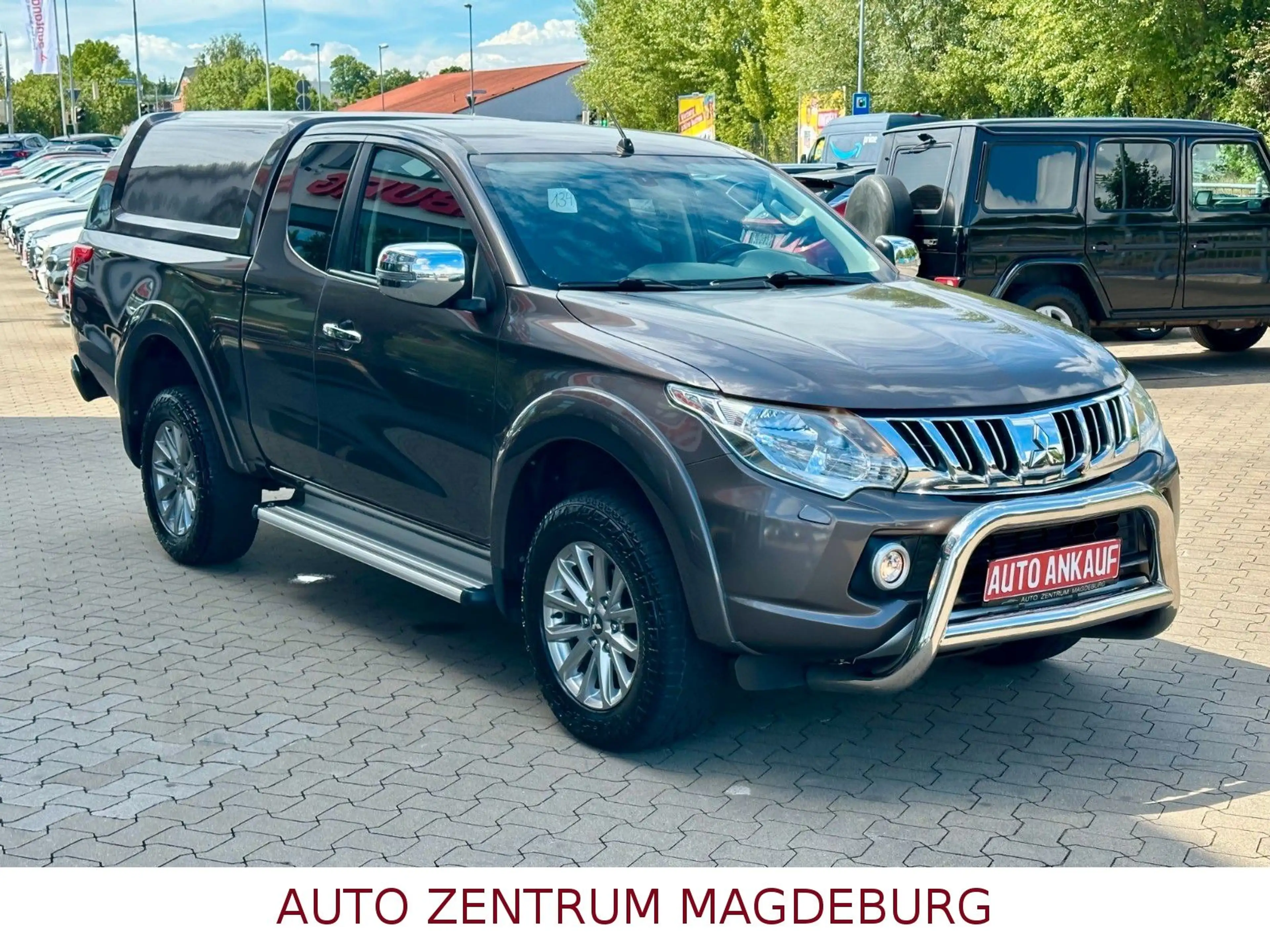 Mitsubishi L200 Plus Club Cab 4WD ALU*ALLRAD*AHK* — photo 4