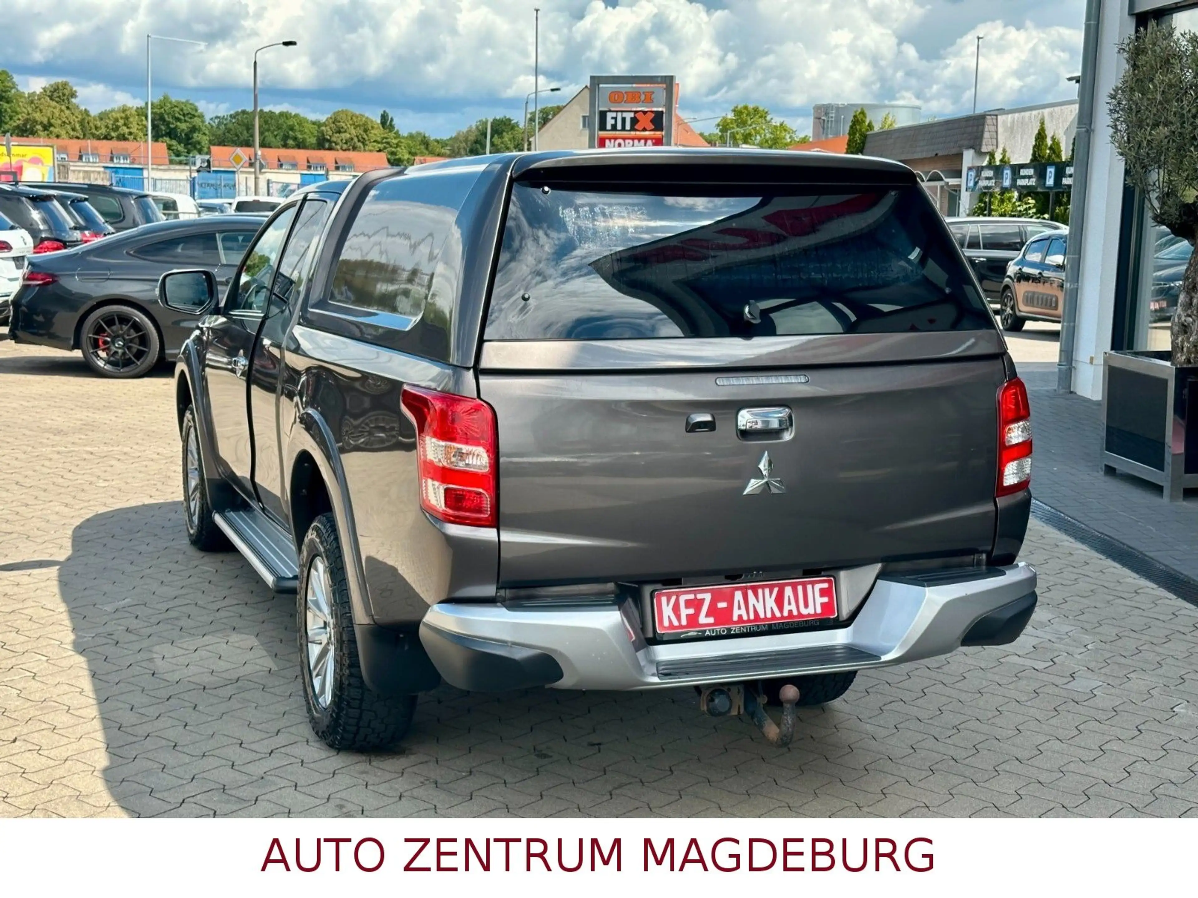 Mitsubishi L200 Plus Club Cab 4WD ALU*ALLRAD*AHK* — photo 9