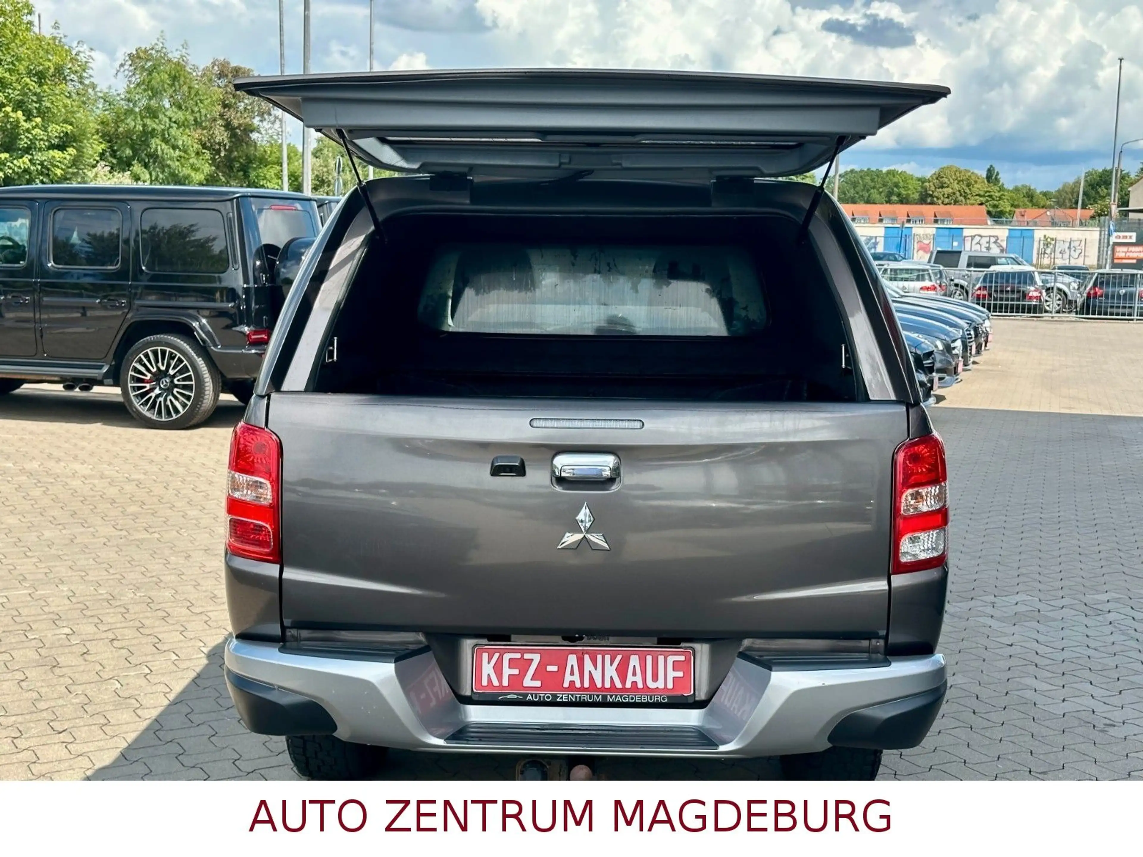 Mitsubishi L200 Plus Club Cab 4WD ALU*ALLRAD*AHK* — photo 7