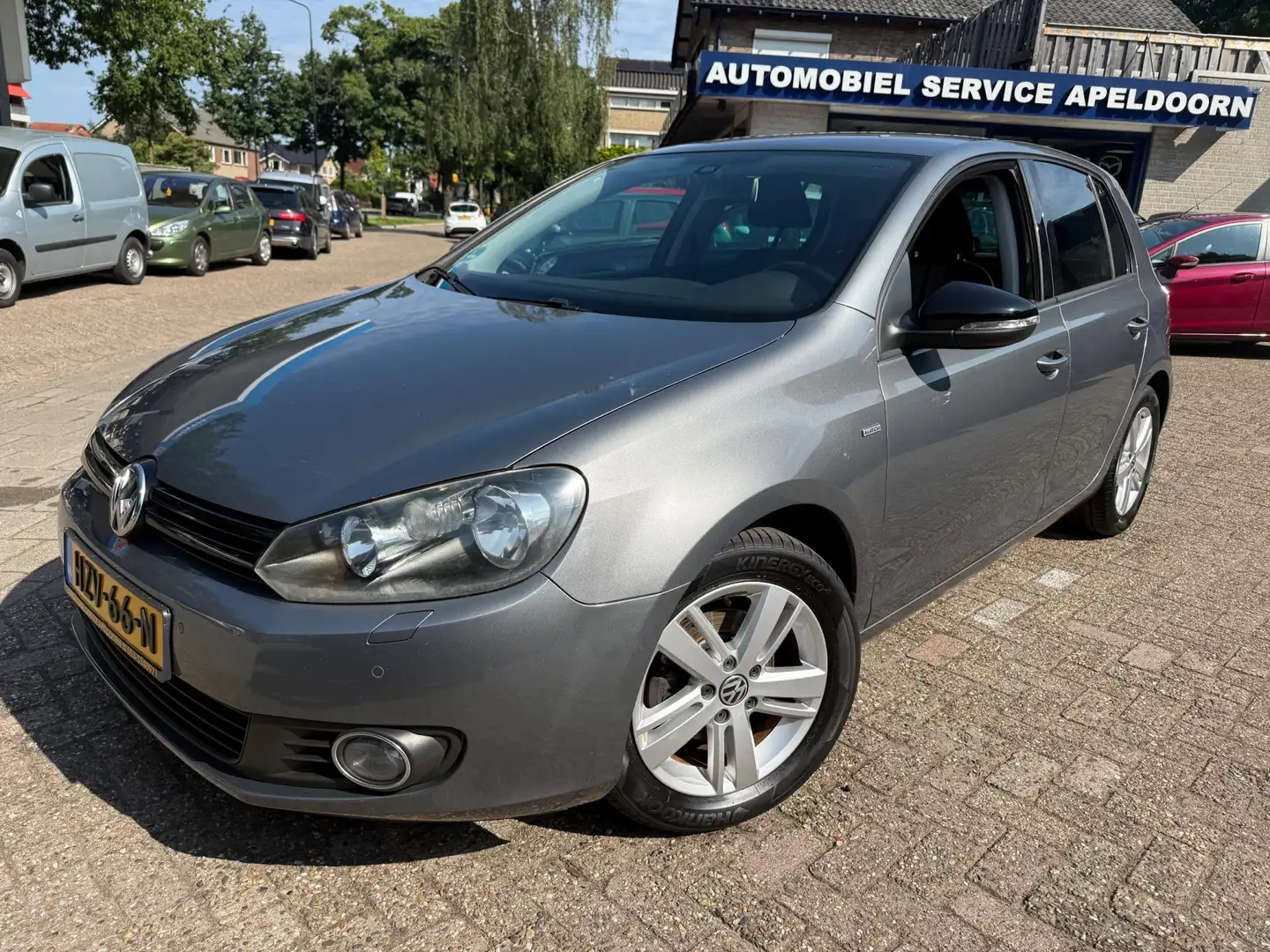 Volkswagen Golf 1.2 TSI Trendline *CLIMA*STOELVERW.*PDC*LM.VELGEN* Gris - 1