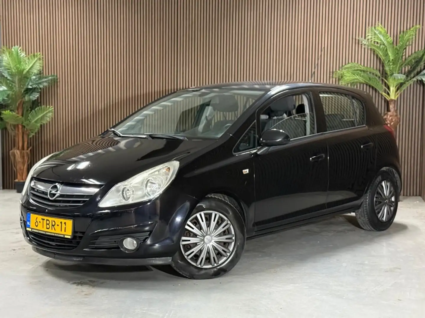 Opel Corsa 1.2-16V Enjoy Zwart - 1