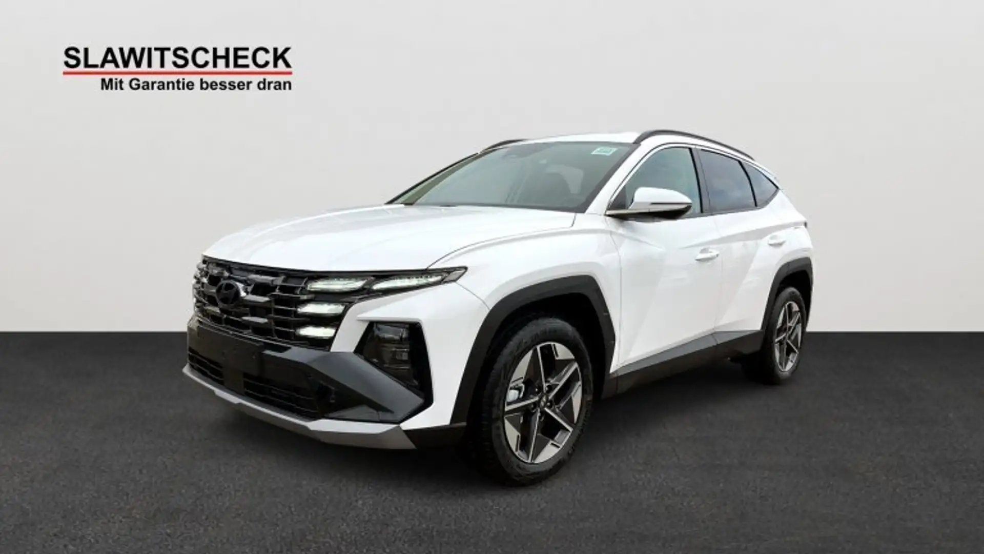 Hyundai TUCSON NX4 GO Plus 1,6 T-GDi HEV 4WD AT t5hu2 Weiß - 1