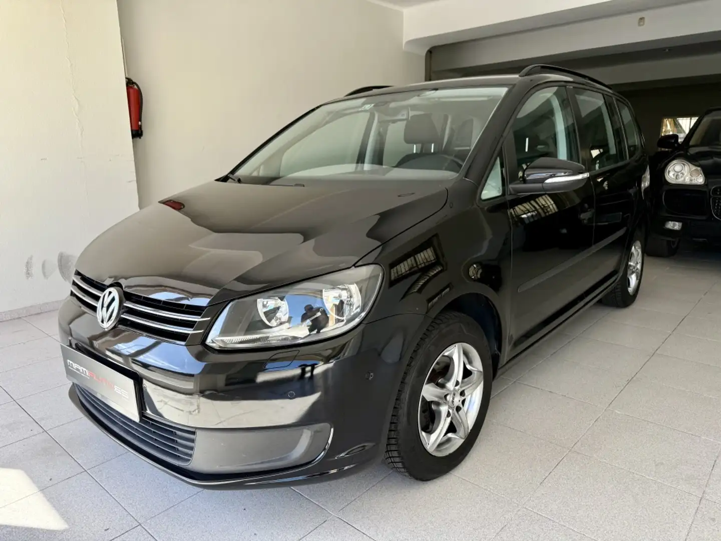 Volkswagen Touran 1.4 TSI Advance Zwart - 1