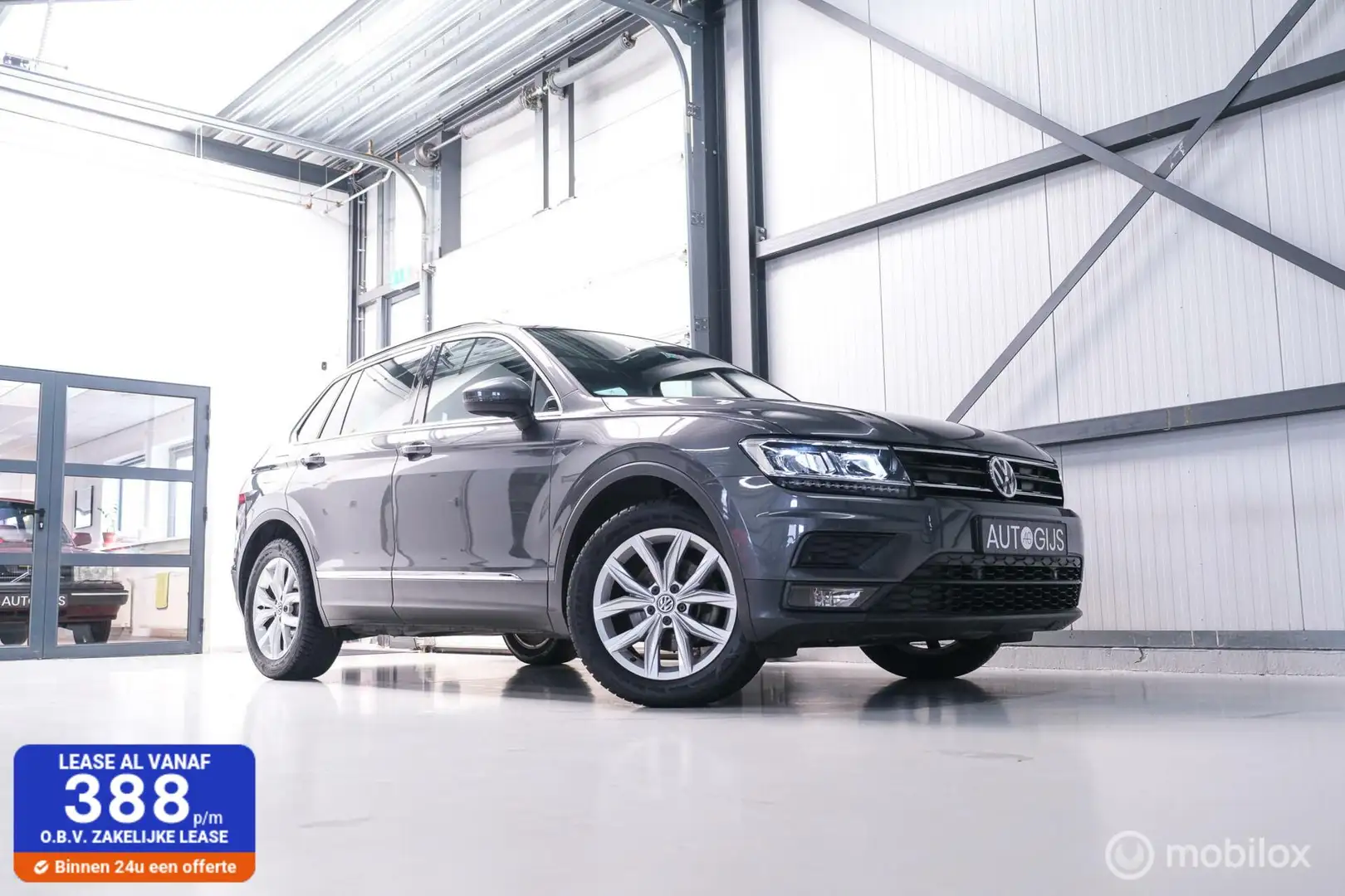 Volkswagen Tiguan 1.4 TSI ACT Comfortline | Trekhaak | Adaptive | 1e Gris - 1