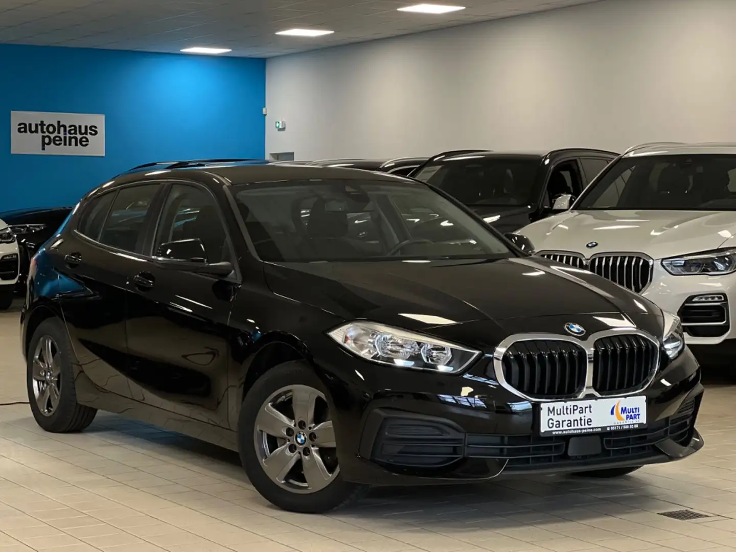 BMW 118 i Advantage Aut/LiveC+/AG+/SitzHeiz/Tempomat Black - 1