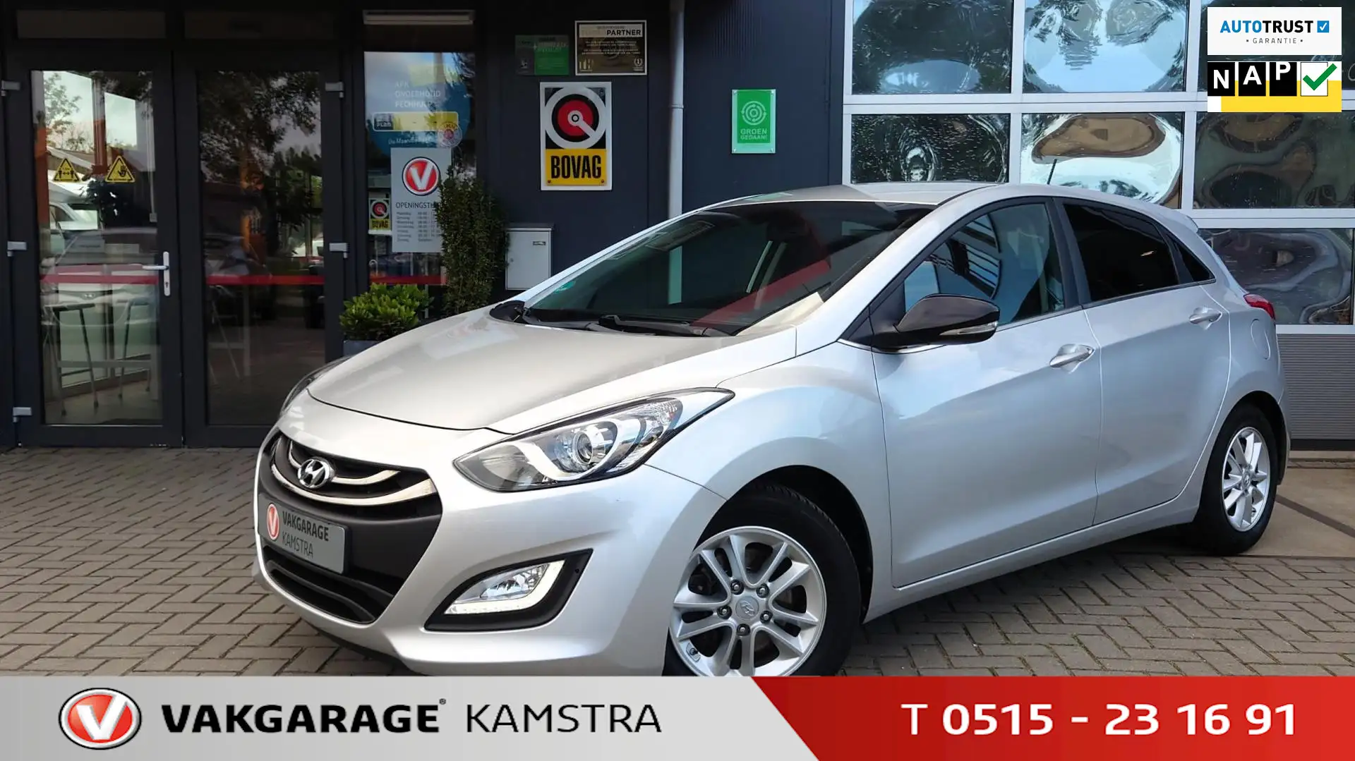 Hyundai i30 1.6 GDI Go! NAP Navi/PDC+Cam/Clima/Cruise/Bluet. Grijs - 1