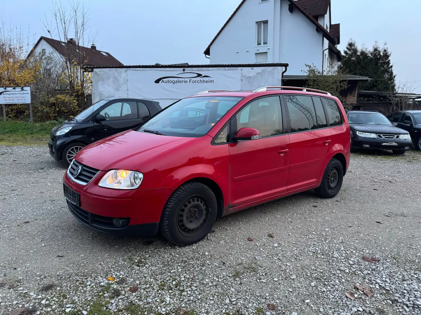Volkswagen Touran Highline*AHK*7 SITZE*KLIMA*SHZ*TÜV Rot - 1