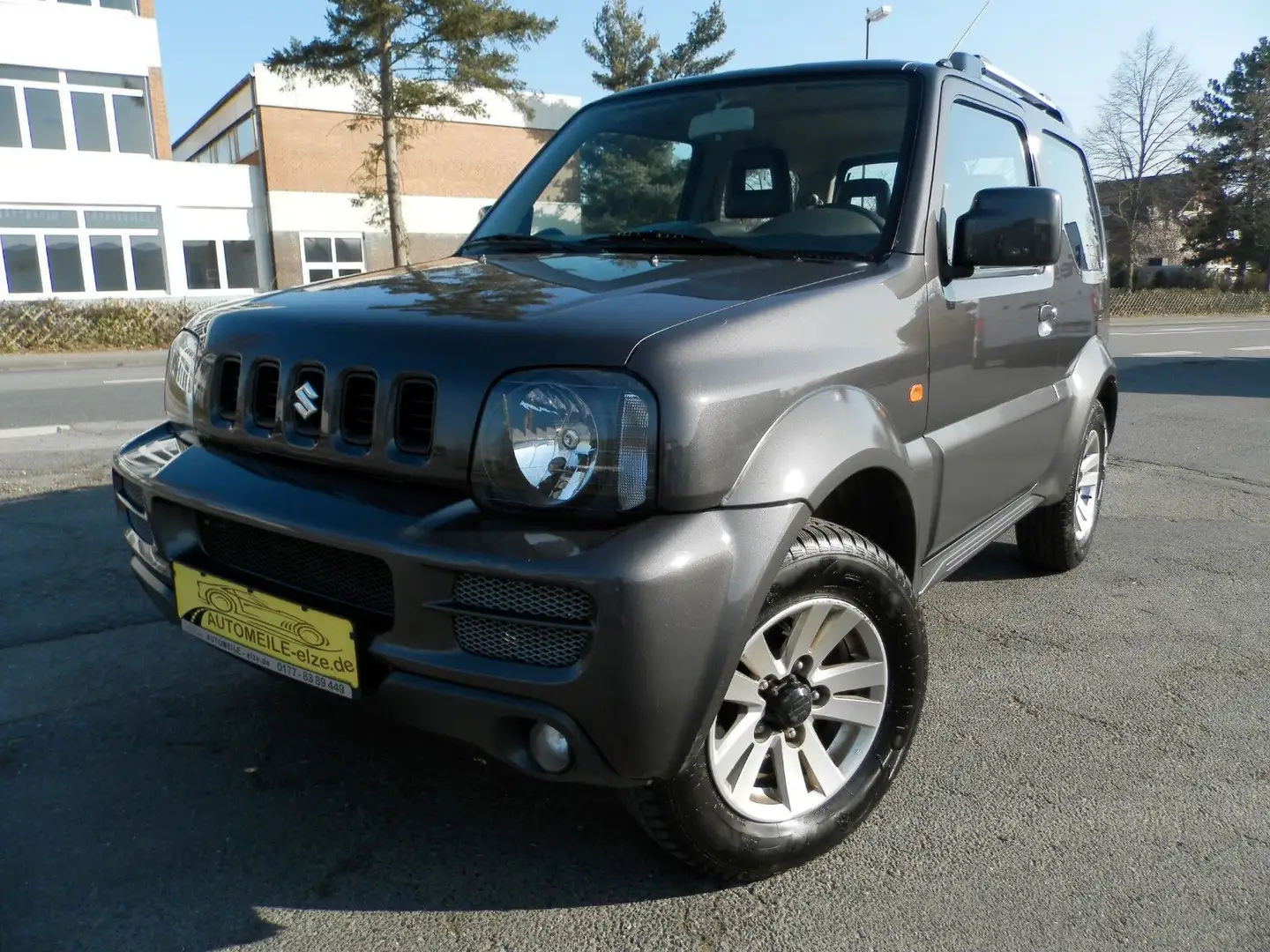Suzuki Jimny 1.3 4WD Comfort*NR.5*Leder*Klima* Gris - 1
