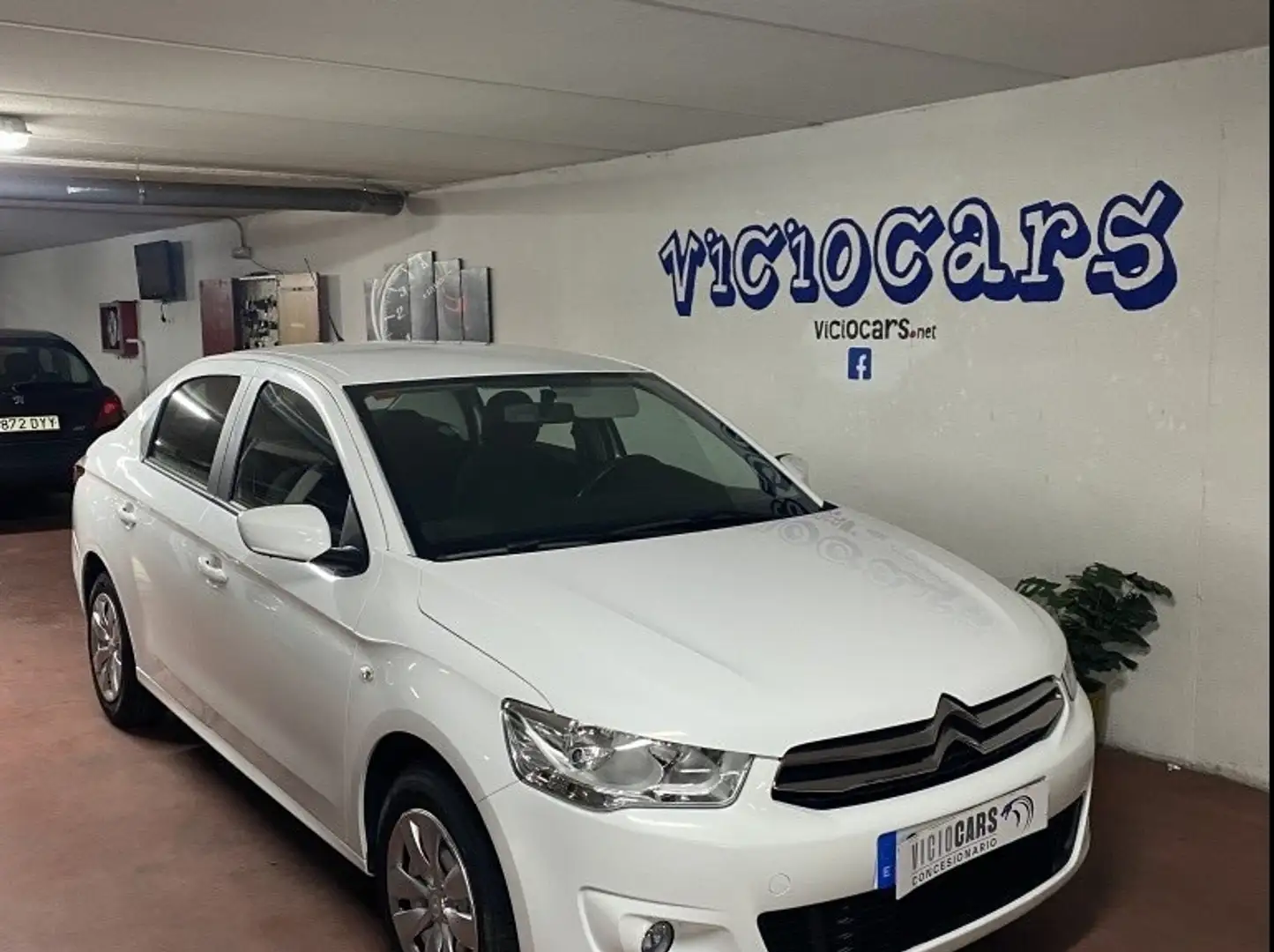Citroen C-Elysée 1.2 PureTech Seduction 82 Weiß - 1