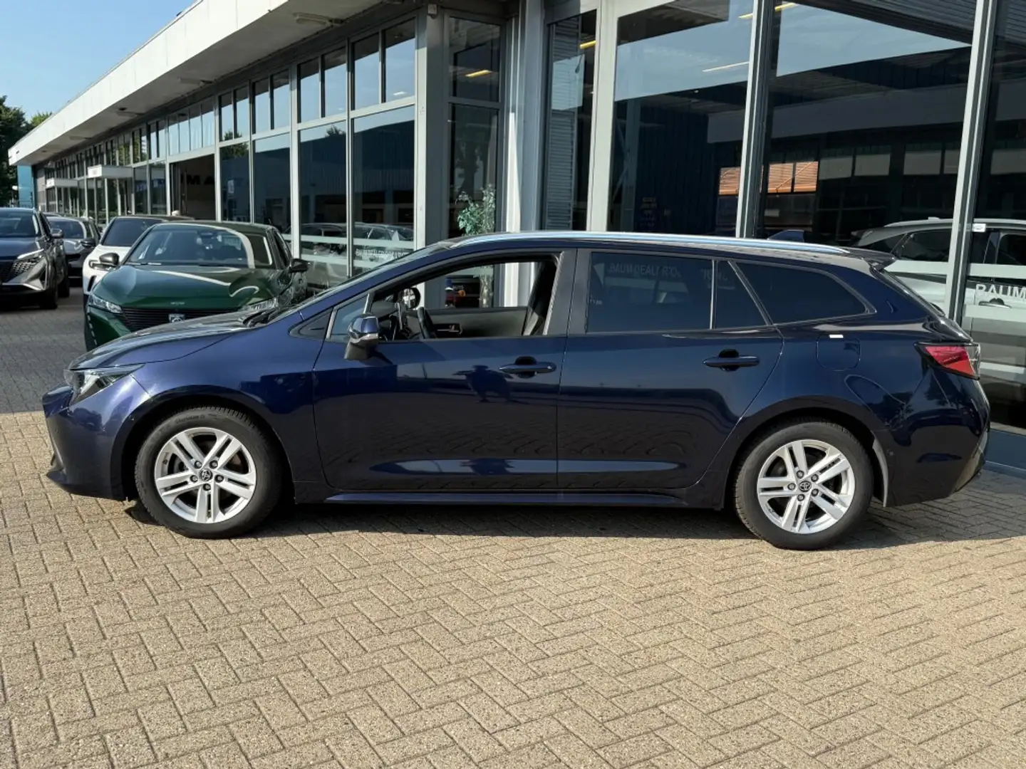 Toyota Corolla 1.8 HYBRID 122PK SPORT AUTOMAAT NAVI PDC LMV SMART Blauw - 2