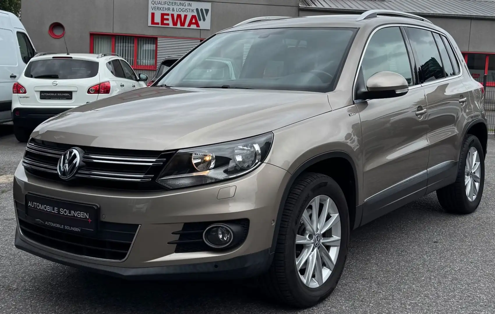 Volkswagen Tiguan Life BMT NAV+AHK+SHZ+WKR+PDC+ALU+KLIMAAUT Beige - 1