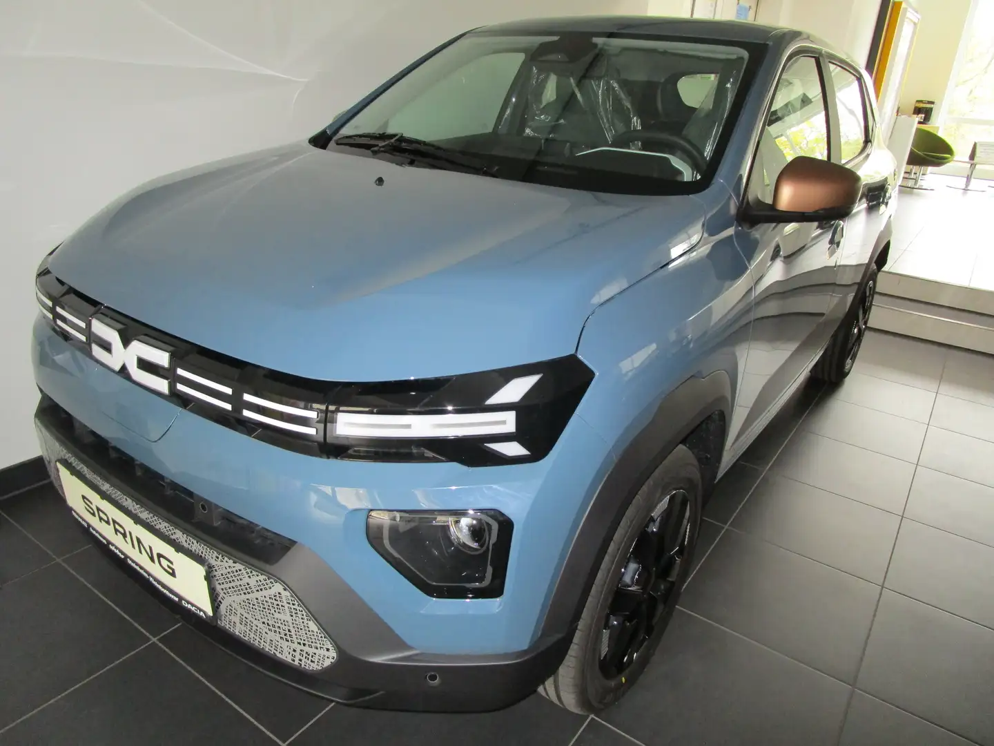 Dacia Spring Extreme Blau - 1
