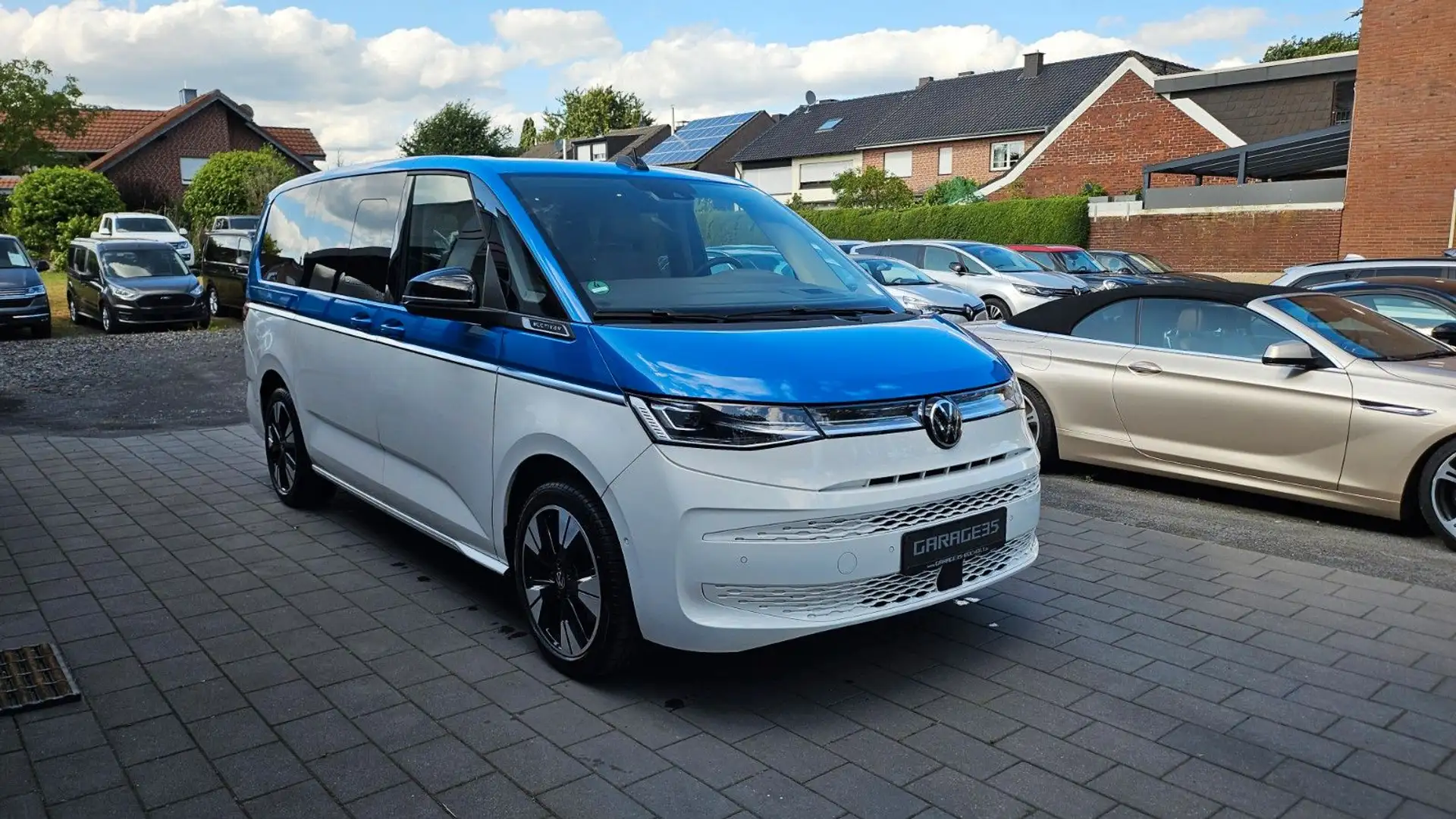Volkswagen T7 Multivan Style lang/PANO/HUD/STHZG/EASY OPEN Wit - 1