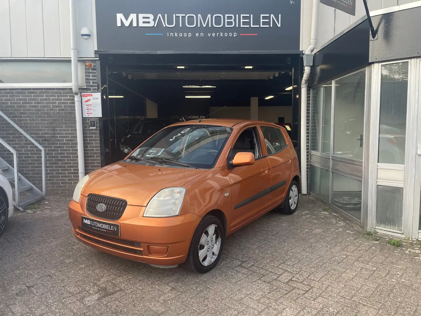 Kia Picanto 1.0 LXE/5 Deurs/stuurbekrachtiging/Electrische ram Orange - 1