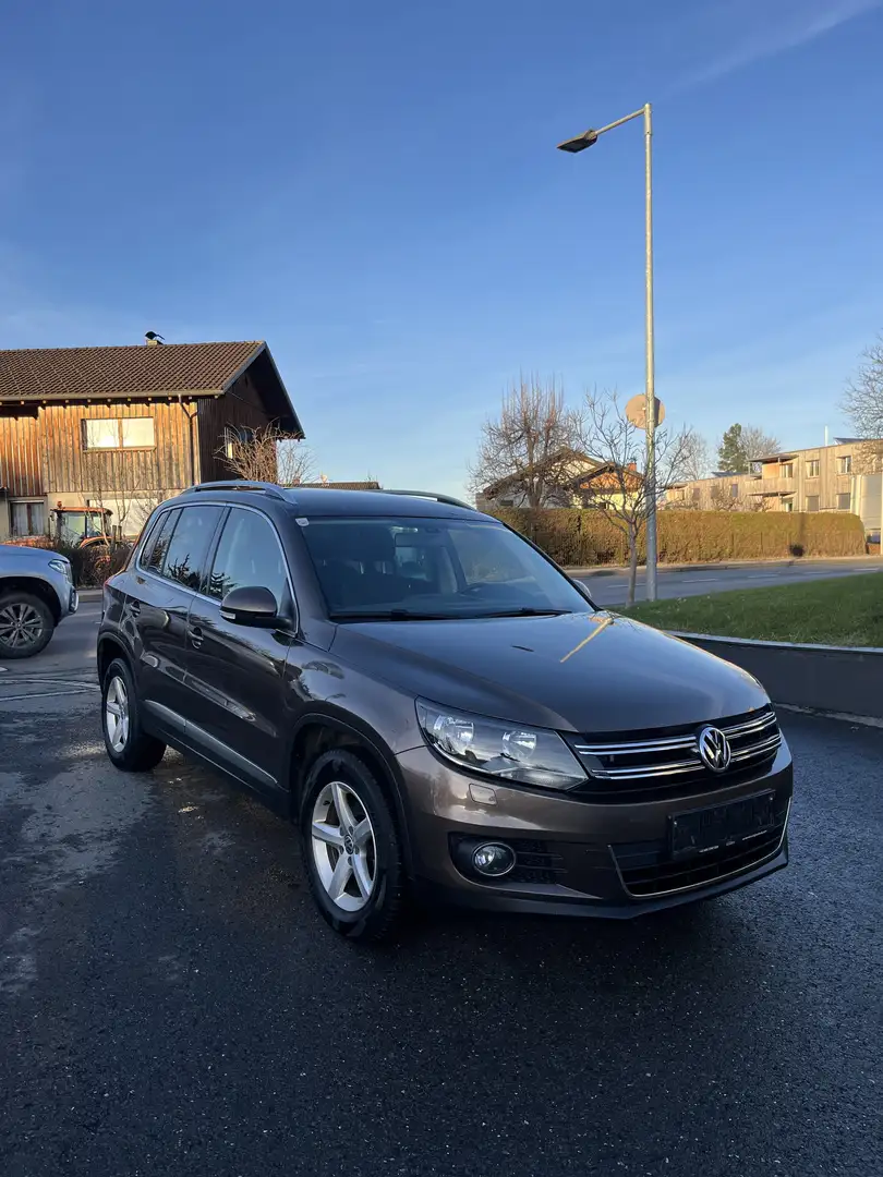 Volkswagen Tiguan Sport Braun - 1