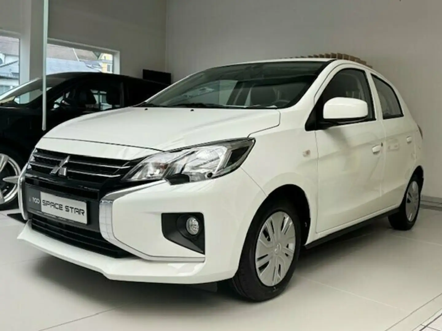 Mitsubishi Space Star Select 1.2 MIVEC 5-Gang Белый - 2